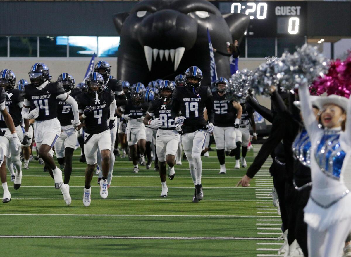 North Crowley Pathers take the field during a UIL football game at Crowley ISD Multi Purpose Stadium on Friday , October 18, 2024.