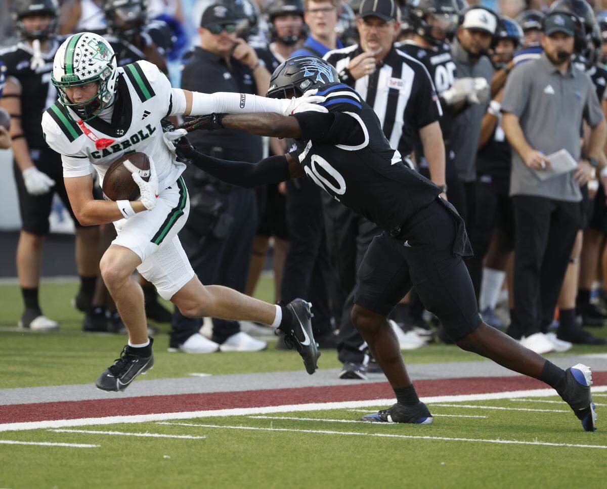 Southlake Carroll wide receiver Brock Boyd makes a catch against Byron Nelson’s Logan Cortez on Sept. 12 at Northwest ISD Stadium.