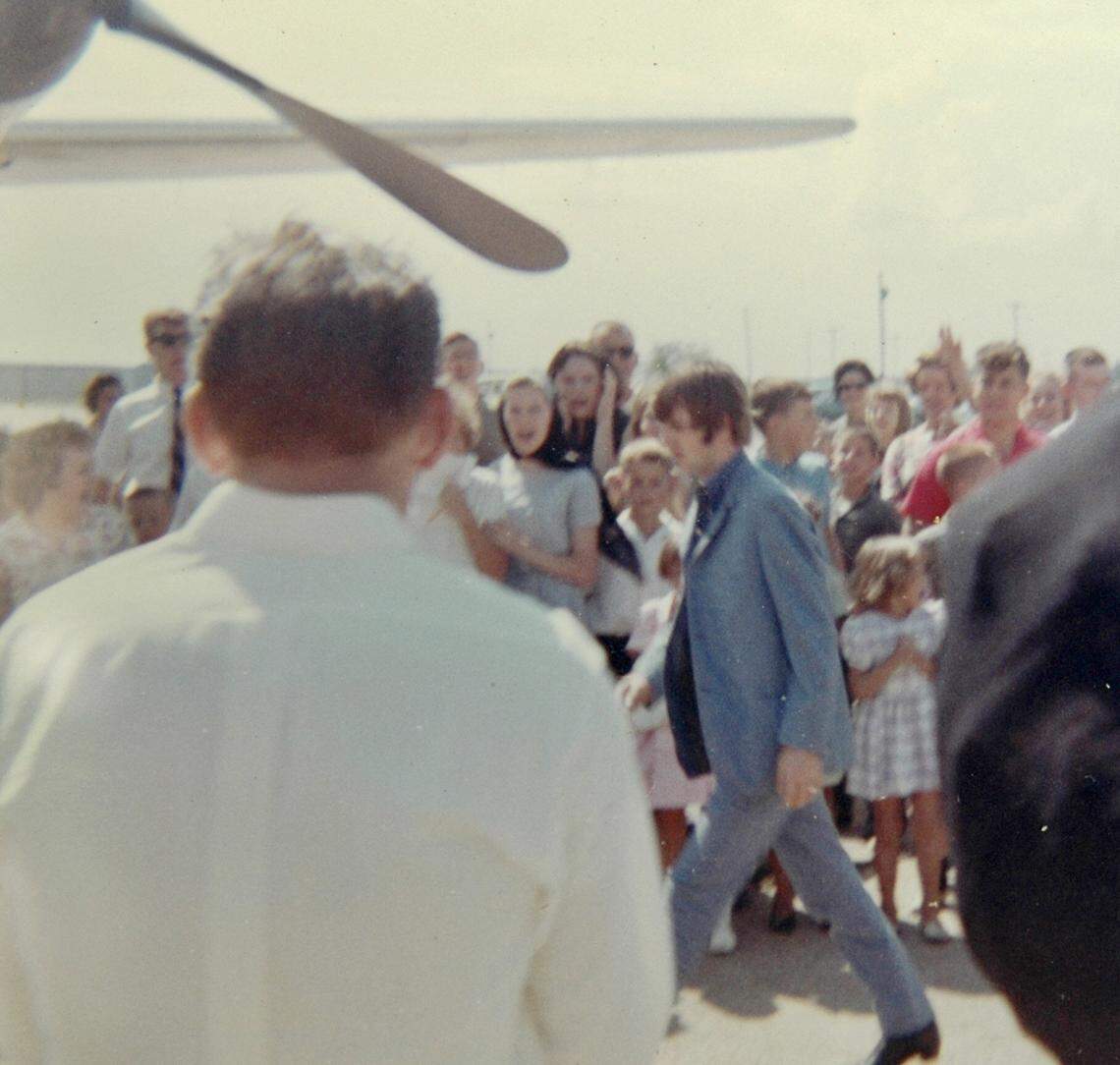 Beatles drummer Ringo Starrtransfers planes in Walnut Ridge, Ark., in a Sept. 19, 1964 file photo, as throngs of area residents cheer the superstars. One of the teenage fans was Carrie Mae Snapp, whose father snapped this photo.