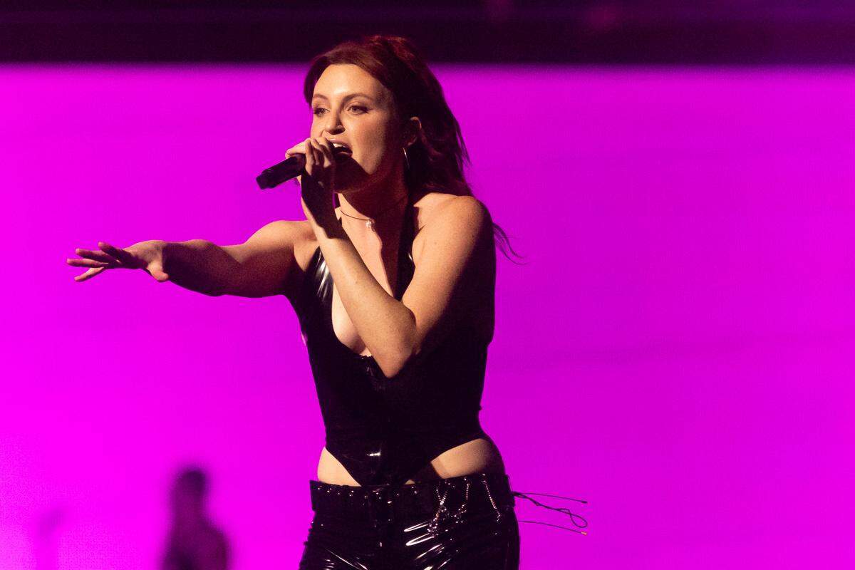 MUNA opens the show for Taylor Swift during her first sold-out concert of three nights at AT&T Stadium in Arlington on Friday, March 31, 2023.