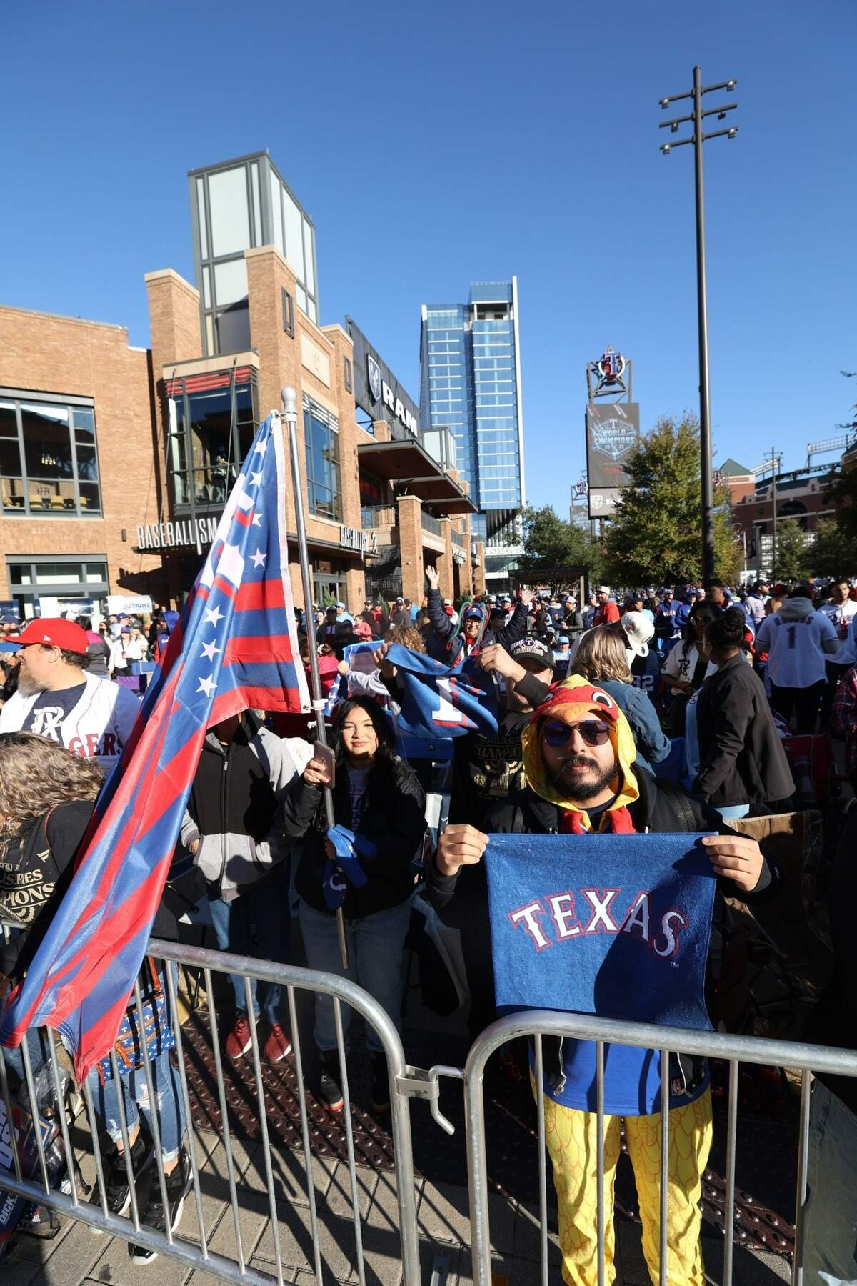 Texas Rangers fans line up for the World Series parade near Globe Life Field on Friday, Nov. 3, 2023.