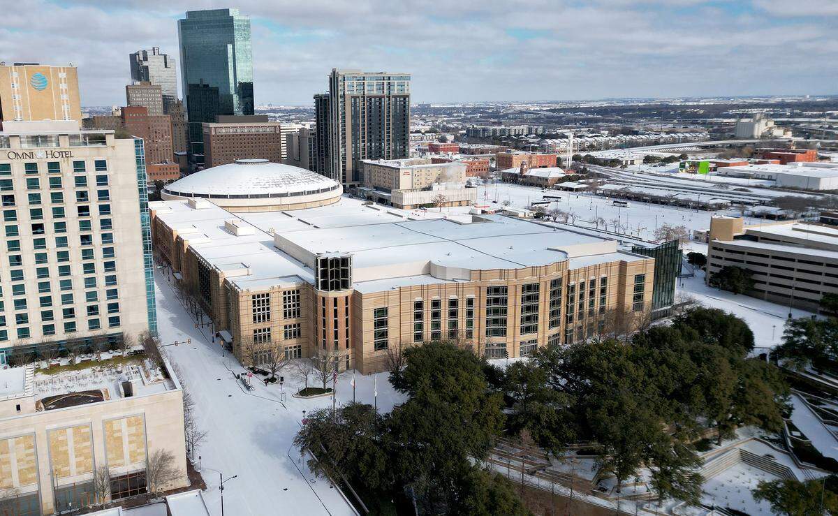 A layer of snow covers downtown Fort Worth on on Sunday, Jan. 25, 2026.