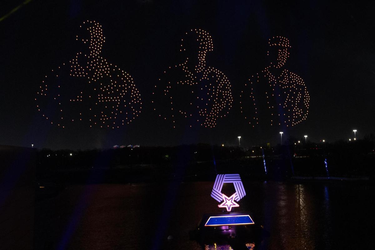Drones are used in the ‘Mission To Inspire Spectacular’ show for the National Medal of Honor Museum Grand Opening Celebration in the Arlington Entertainment District on Saturday, March 22, 2025.