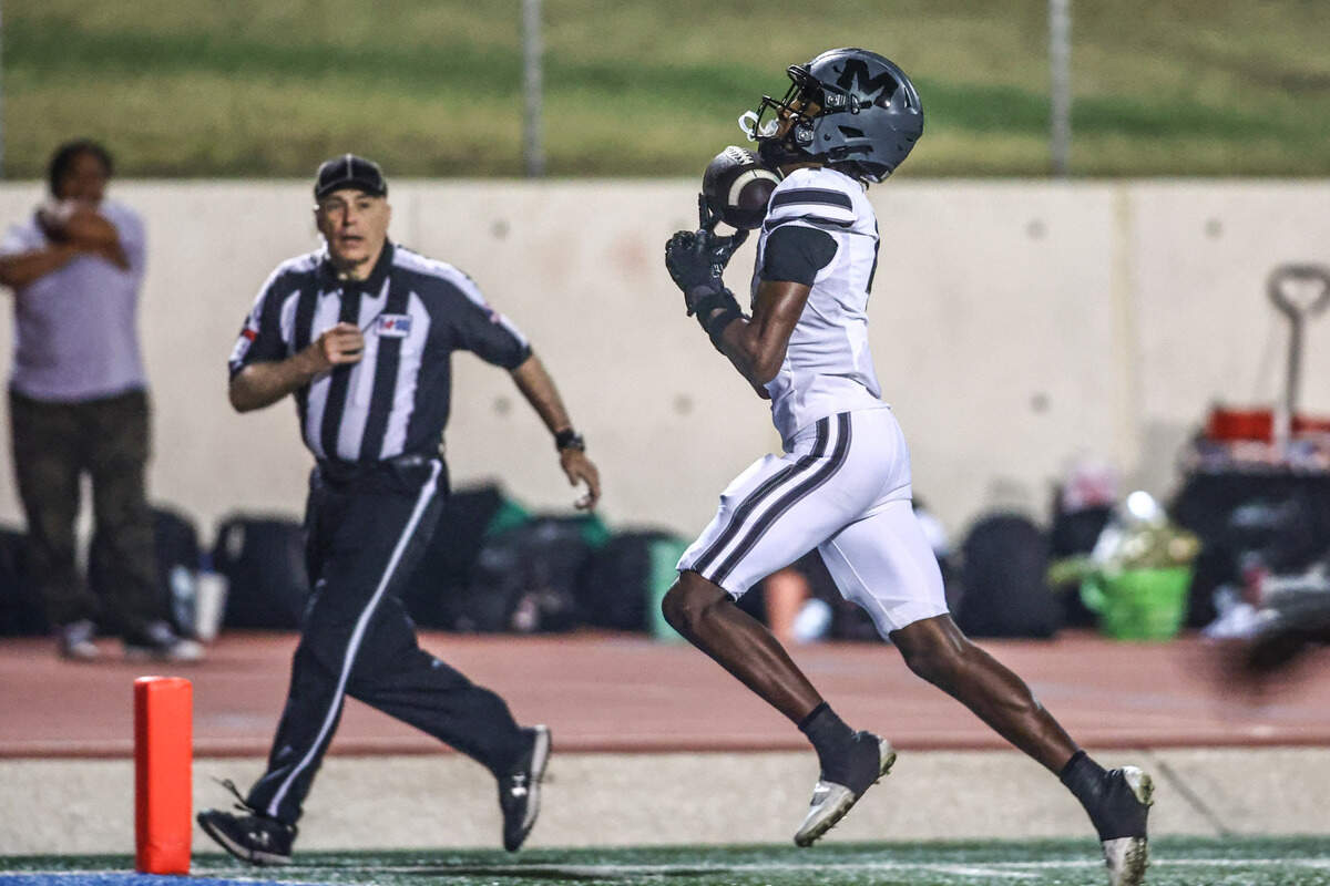 Arlington Martin receiver Brody Williams makes a long touchdown catch against the Arlington Colts at the Thursday, Nov. 7 game at UTA’s Maverick Stadium in Arlington. Special to the Star-Telegram / Tom Marvin