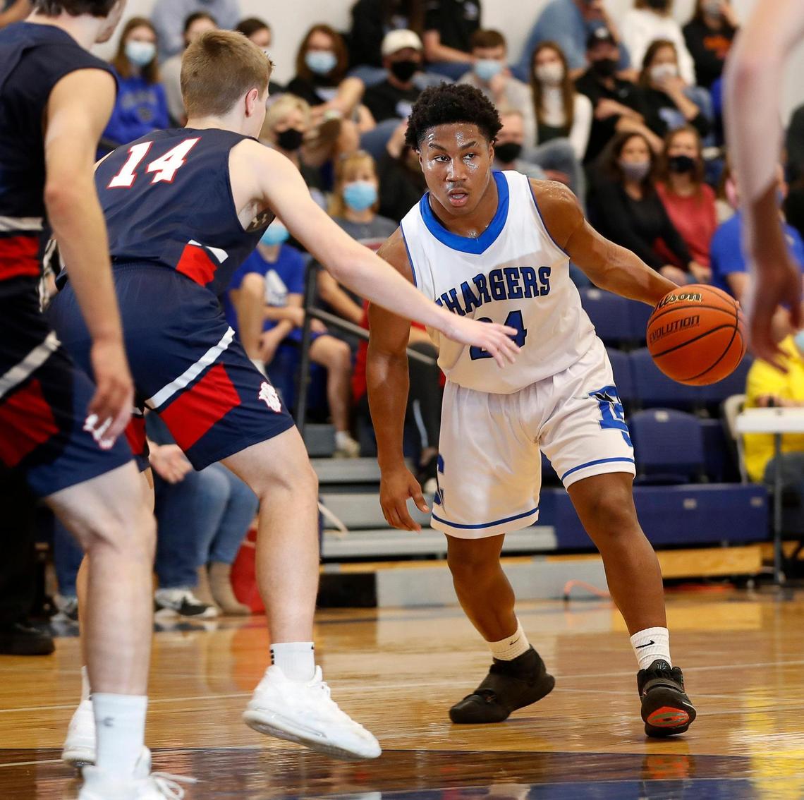 Dallas Christian guard Shon Coleman (24) drives into traffic during the TAPPS 5A regional basketball playoff game at Grace Prep in Arlington, Texas, Saturday, March 06, 2021. Grapevine Faith defeated Dallas Christian 52-48. (Special to the Star-Telegram Bob Booth)