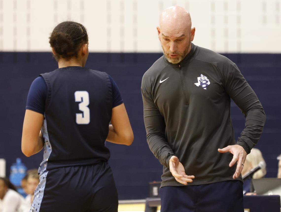 L.D. Bell head coach Andy Bloodworth gives some instructions to guard QuaNesha Horn (3) during the first half of a UIL girls basketball game between L.D. Bell and Keller at Keller High School in Keller, Texas, Friday Jan. 16, 2026