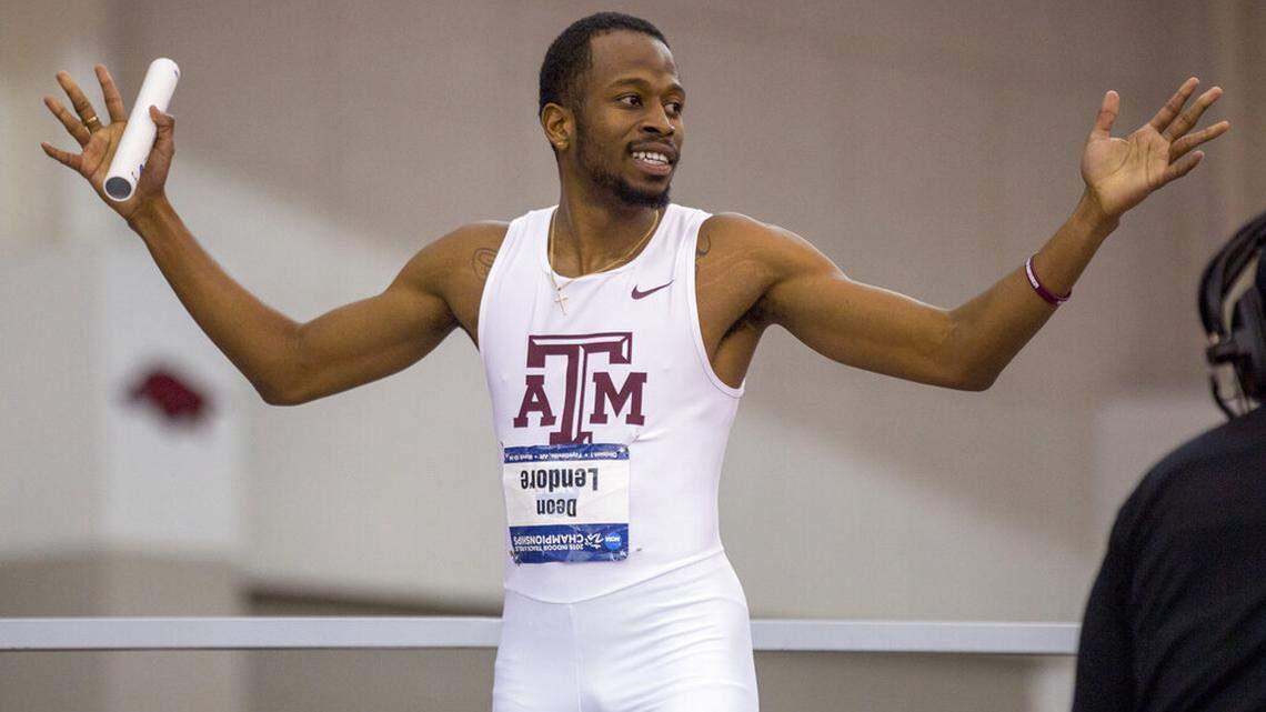 Texas A&M’s Deon Lendore celebrates after running the anchor leg of the 1,600 relay during the NCAA indoor track and field championships Saturday, March 14, 2015, in Fayetteville, Ark. Lendore died on Monday, Jan. 10, 2022.