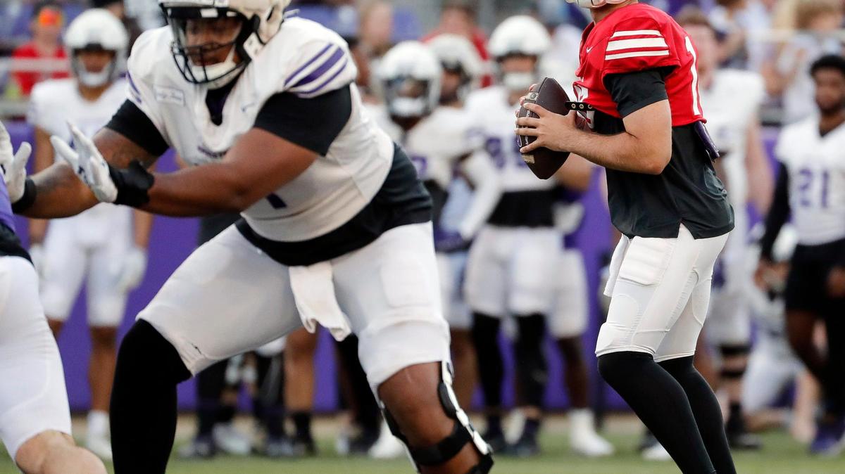 TCU quarterback Josh Hoover (10) looks for a receiver during Friday’s spring game at Amon G. Carter Stadium.