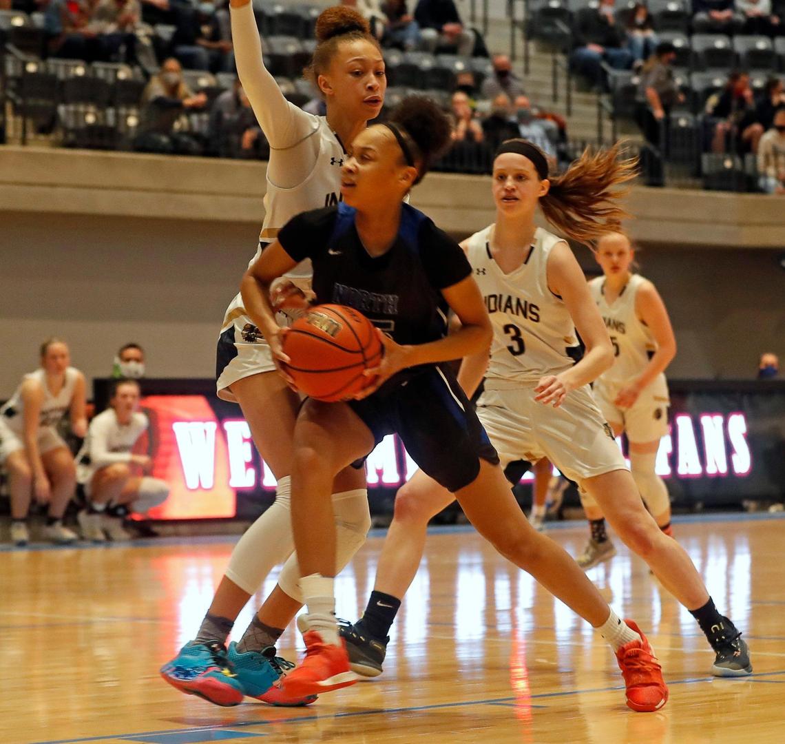 North Crowley center Maiyah Watkins (25) drives to the net during the first half of a Division 6A Region 1 quarterfinal basketball game at Arlington ISD Complex in Arlington, Texas, Thursday, Feb. 25, 2021. Keller led 31-26 at the intermission. (Special to the Star-Telegram Bob Booth)