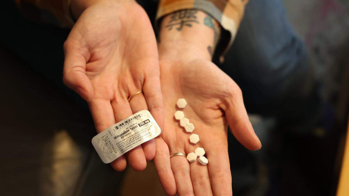 An abortion-rights advocate holds abortion pills. A recent study published in the JAMA network shows that a rise in purchasing abortion medication by women requesting advance provision.