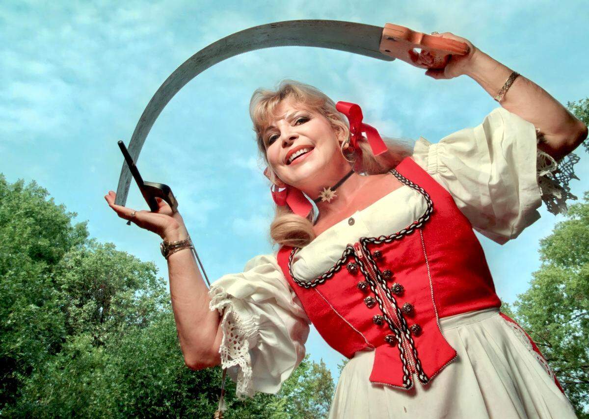 Helga Beckman, seen here in 1998, sang and played the musical saw weekends at Edelweiss German Restaurant.