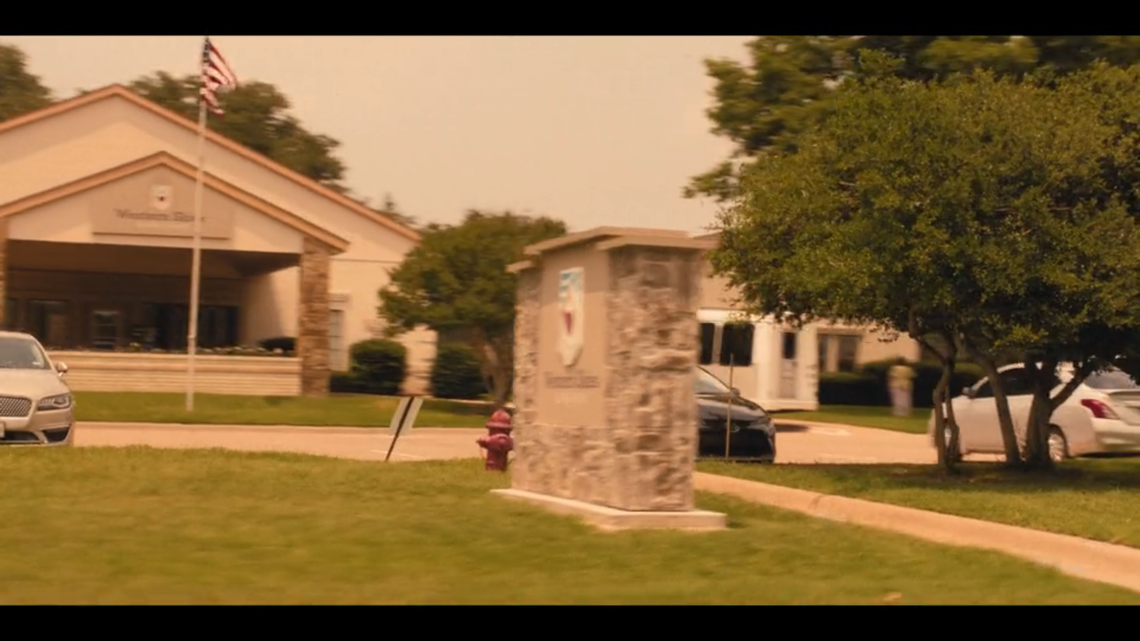 Angela and Ainsley drive by a nursing home in “Landman” episode 7.