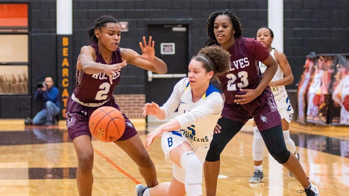 Timberview’s Destiny Jackson (left) and Mikayla Hutchinson defend Boswell’s Jada Russell in a regional quarterfinal game, Monday Feb. 18, 2019 from Aledo HS. Timberview won 68-46.