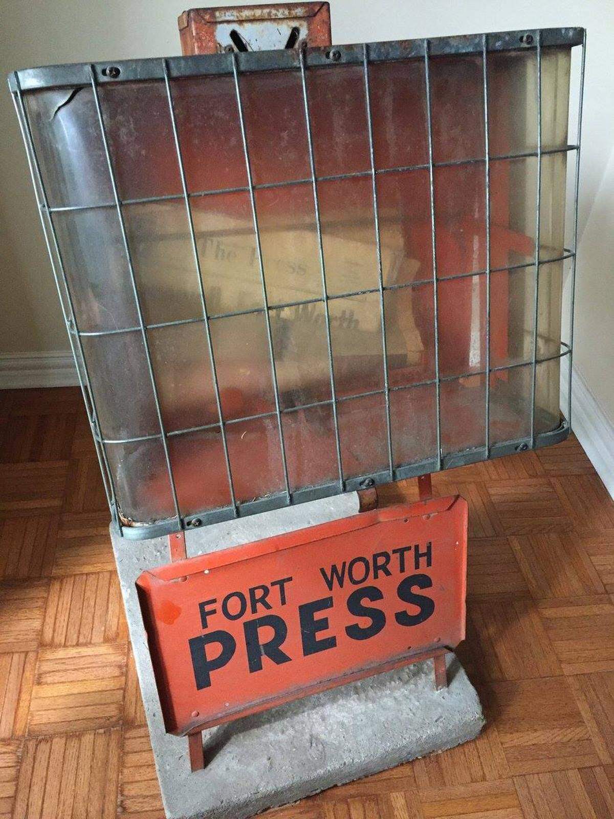 A Fort Worth Press coin rack.