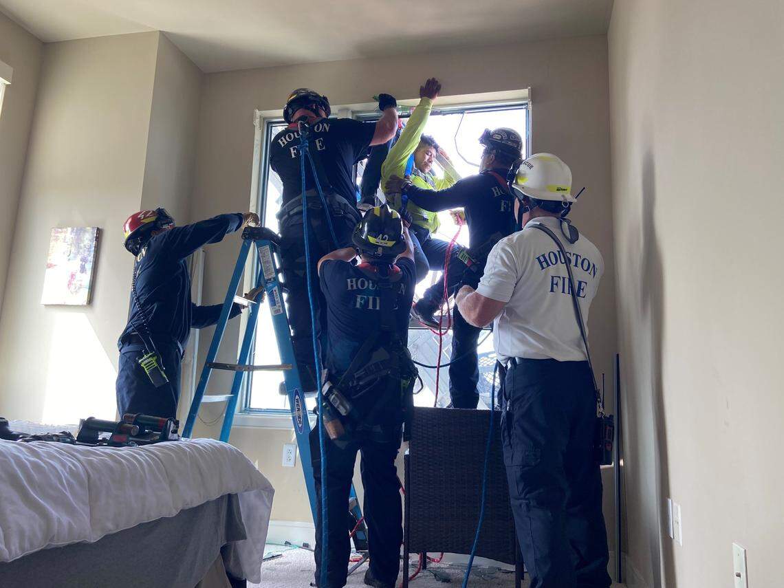 Houston Fire Department dramatically rescues two window washers after their platform collapses outside a high rise building.