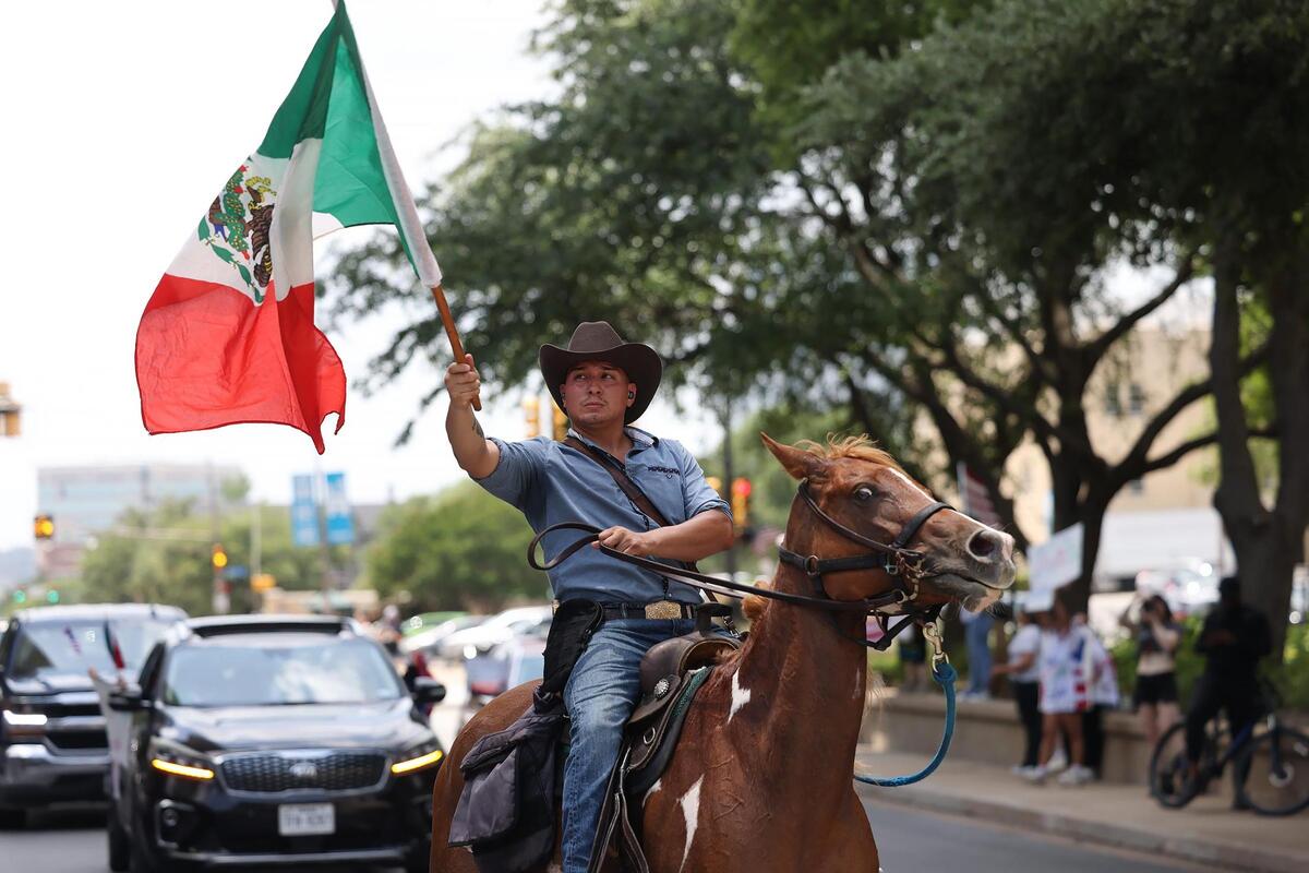 Protesters rally during the “No Kings Day” protest in downtown Fort Worth on June 14, 2025.