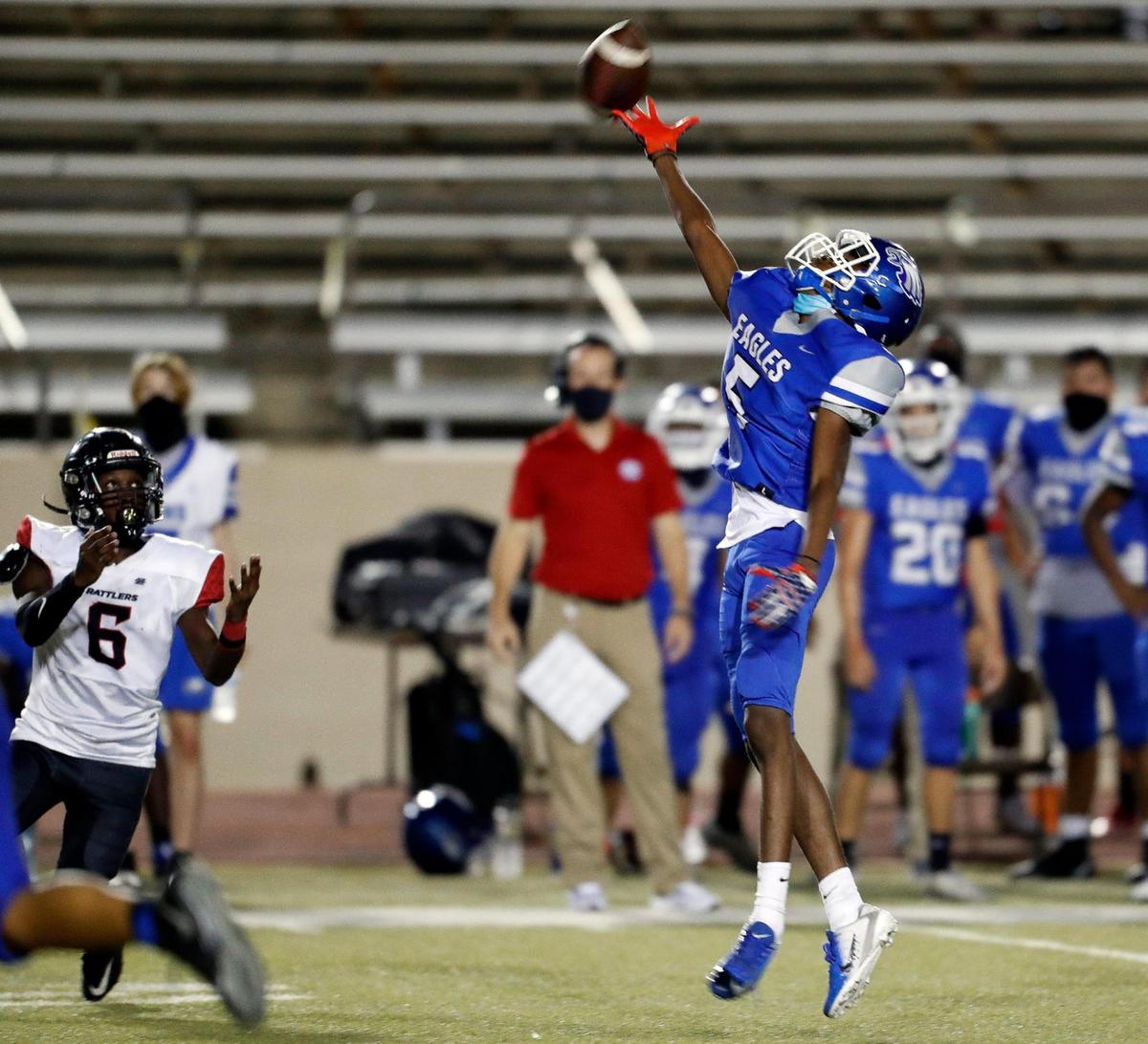 Riverside’s Jadan Thompson tips a pass intended for Atlas’ Ethan Lee-Davis during a high school football game at Farrington Field, in Fort Worth, Friday, Sept. 11, 2020. Carter Riverside defeated Crowley Atlas. (Special to the Star-Telegram Bob Booth)