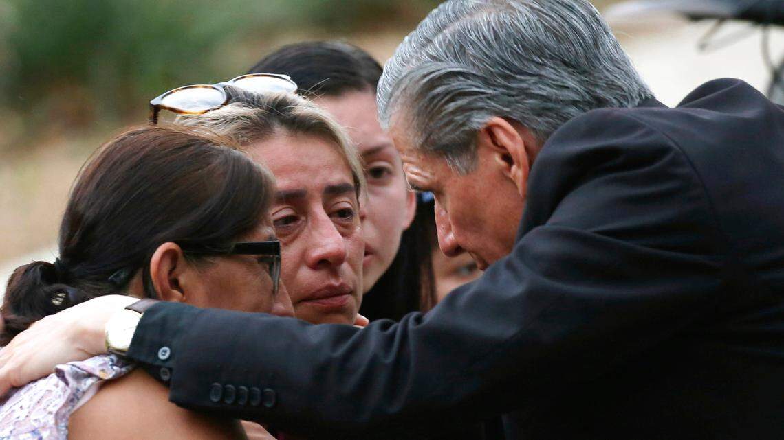The archbishop of San Antonio, Gustavo Garcia-Siller, comforts families outside the Civic Center following a deadly school shooting at Robb Elementary School in Uvalde on Tuesday.