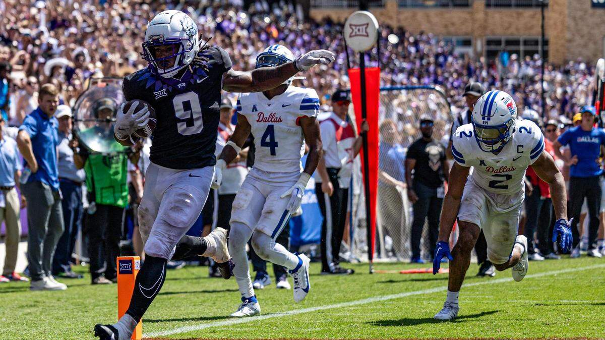 TCU running back Emani Bailey (9) scores a touchdown against SMU at Amon G. Ctarter Stadium on Saturday.