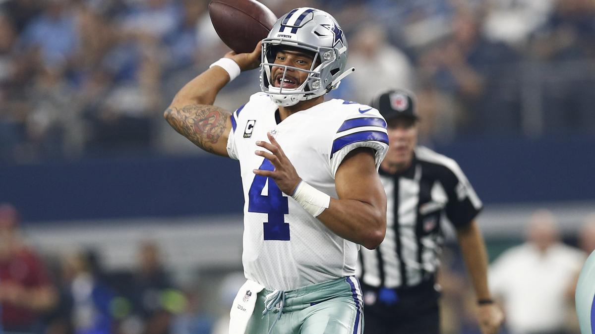 Dallas Cowboys quarterback Dak Prescott (4) looks to pass against the Detroit Lions during the first half of an NFL football game, Sunday, September 30, 2018, at AT&T Stadium in Arlington, Texas.