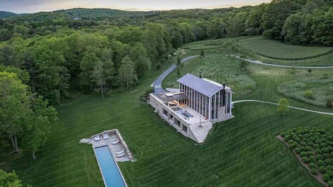The upscale house sits on a whopping scenic 127 acres.