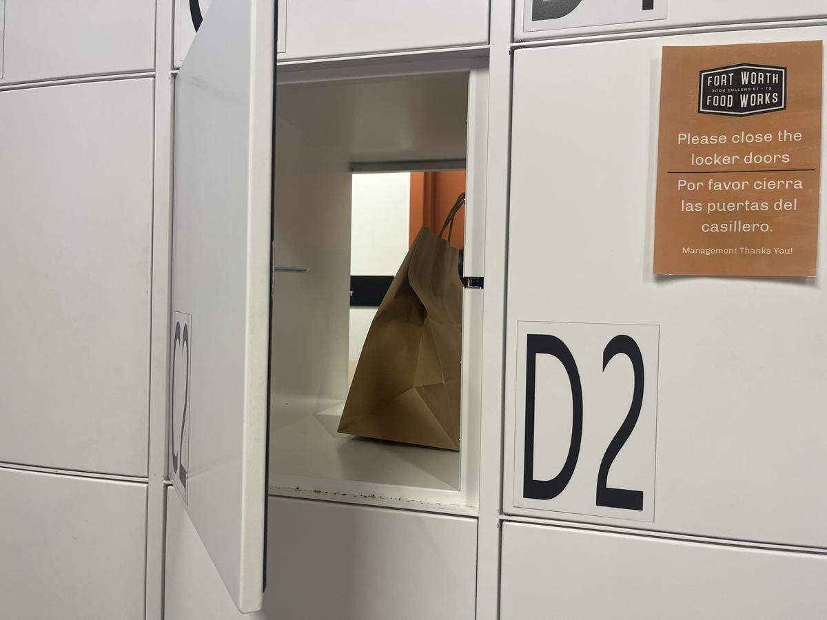 Orders from the Fort Worth Food Works ghost kitchen are kept in individual lockers. To pick up an order and unlock the locker, guests simply scan their receipt.
