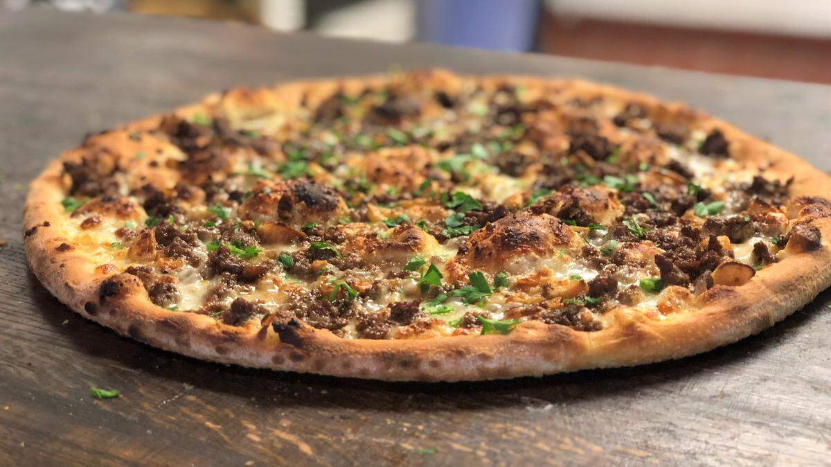 The garlic picanha pizza at Delucca Gaucho Pizza and Wine.