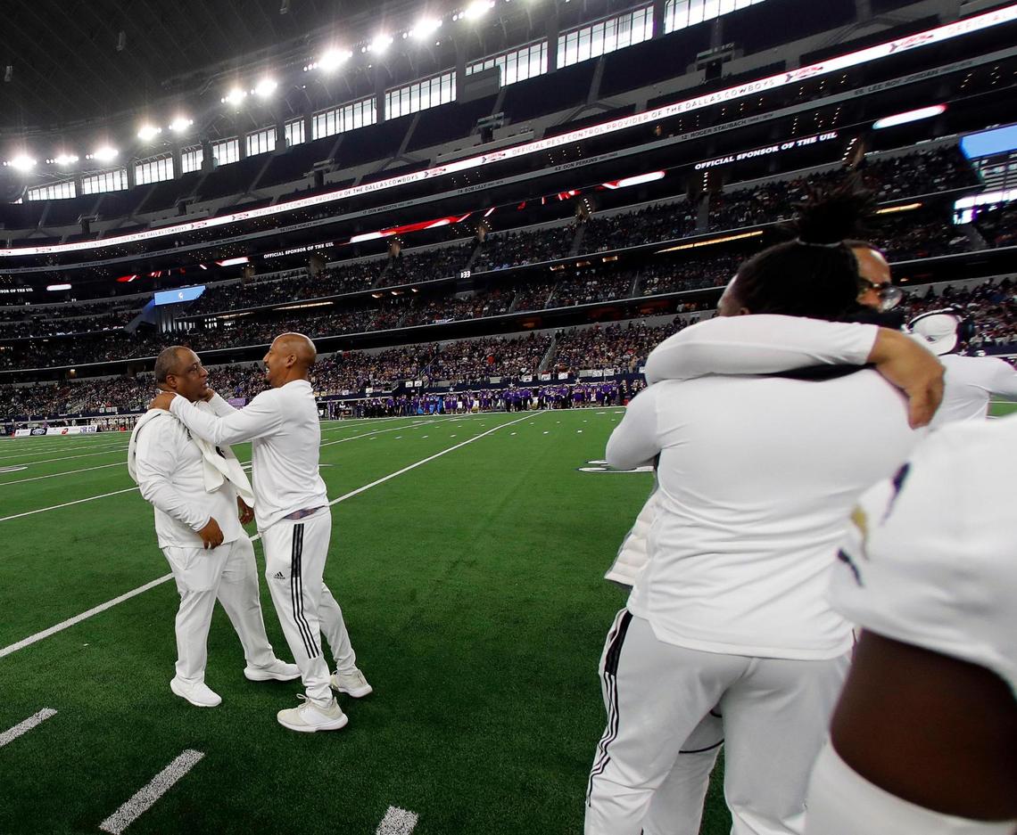 South Oak Cliff head coach Jason Todd is congratulated on the sidelines with :40 remaining in a high school 5A division 2 state championship football game at AT&T Stadium in Arlington, Texas, Saturday, Dec. 18, 2021. SOC defeated Liberty Hill 23-14 to bring Dallas its first championship since 1958. (Special to the Star-Telegram Bob Booth)