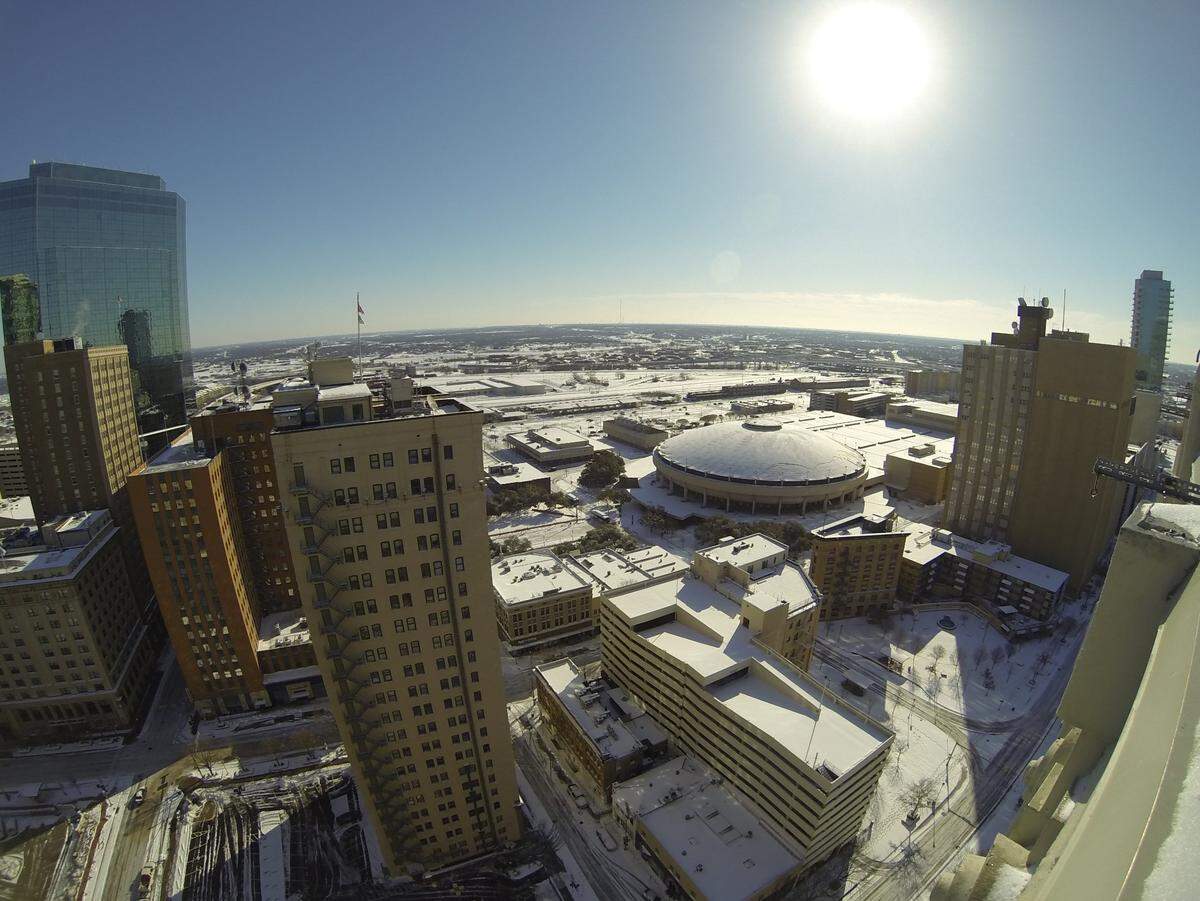 March 5, 2015: Sleet and snow overnight Wednesday left all of North Texas under a slippery white blanket. Downtown Fort Worth rooftops were glistening under a layer of snow and ice.