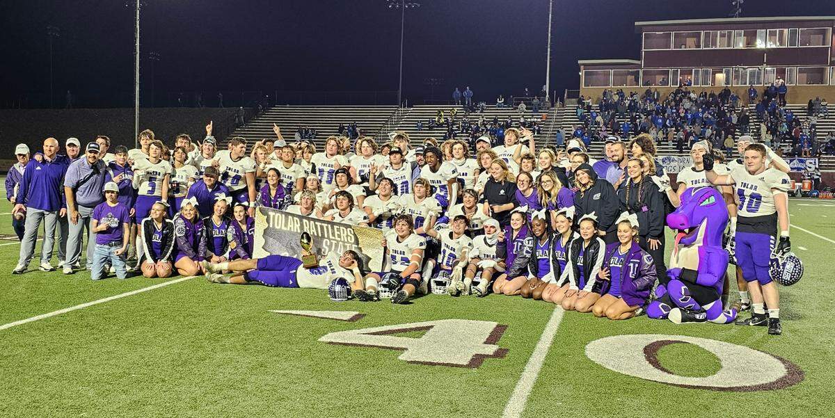 The Tolar Rattlers pose with the Class 2A Division 1 state semifinal trophy after defeating Stratford on Thursday, December 7, 2023 at Lion Stadium in Vernon, Texas. Tolar will play in its first state title game next week.