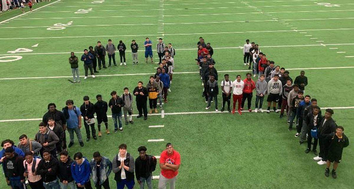 Football players at Arlington Sam Houston paid tribute to Kobe Bryant, Monday Jan. 27, 2020.
