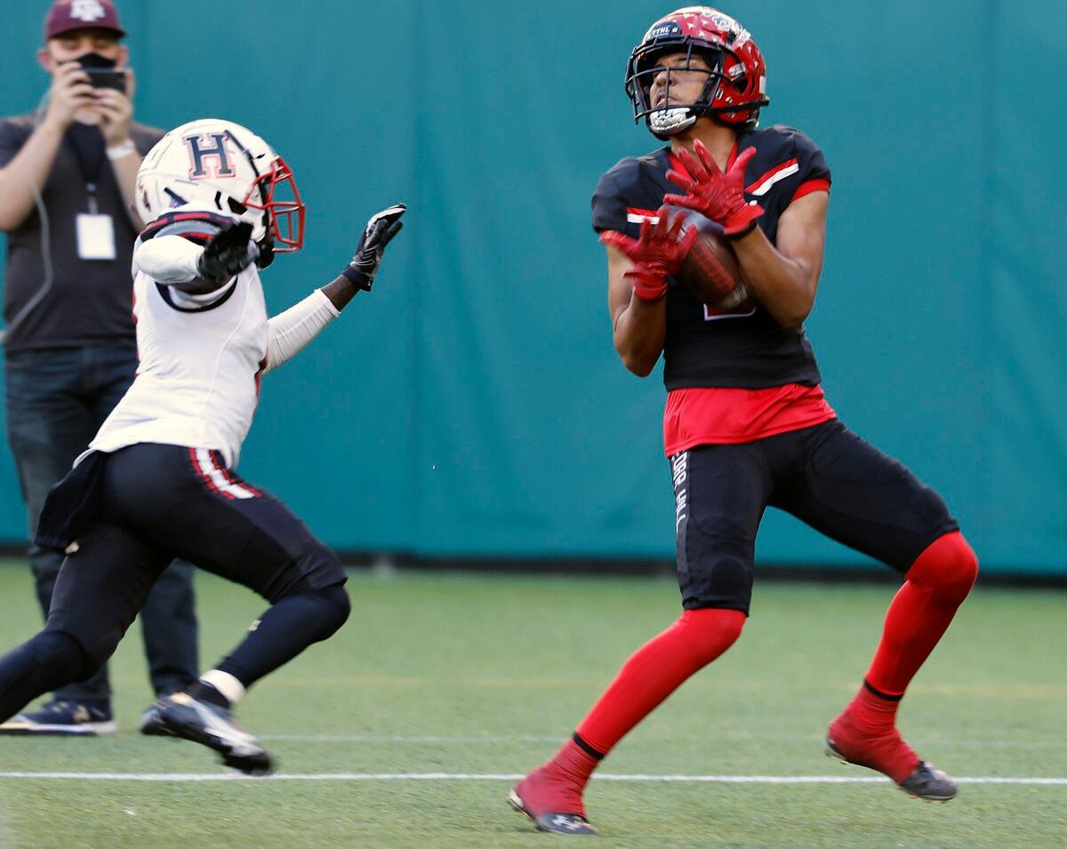 Cedar Hill wide receiver Julian Austin (3) grabs a pass in the end zone that was negated by a penalty during the 6A division 2 quarterfinals at Globe Life Park in Arlington, Texas, Saturday, Jan. 02, 2021. The game was knotted at 14 at the half. (Special to the Star-Telegram Bob Booth)