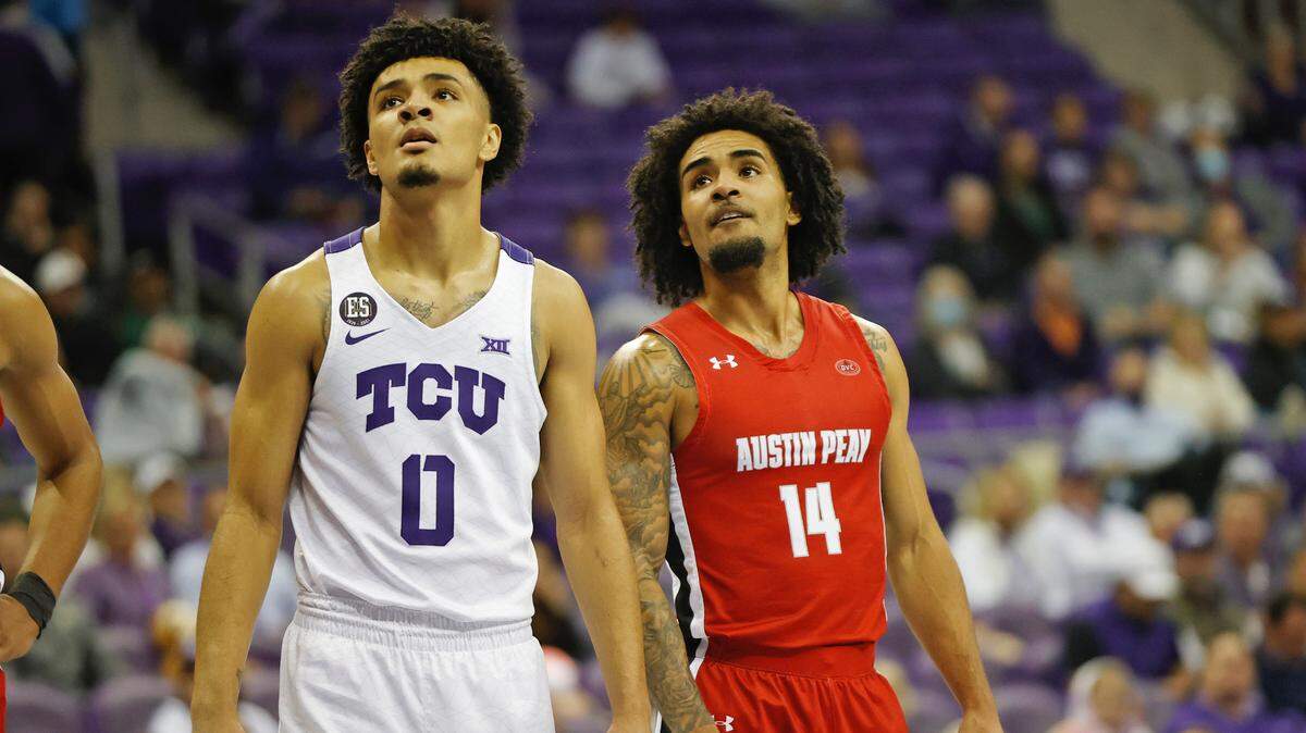 TCU guard Micah Peavy, left, and brother DJ Peavy, of Austin Peay, right, grew up playing against each other as young kids but had never played against one another until Monday night.