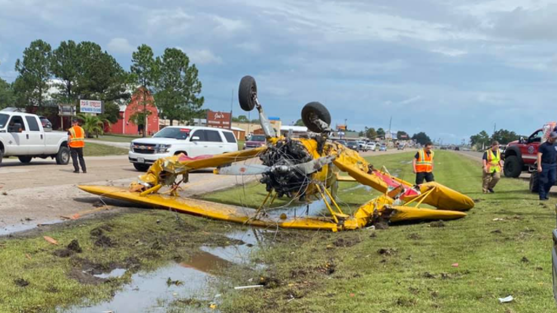 An airplane came crashing down onto a highway after a parade in Winnie, Texas.