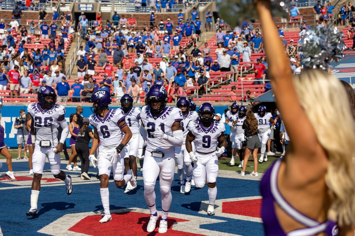 TCU runs onto the field before their rivalry game against SMU on Saturday, Sept. 24, 2022, at the Gerald Ford Stadium in the Southern Methodist University in Dallas, Texas.