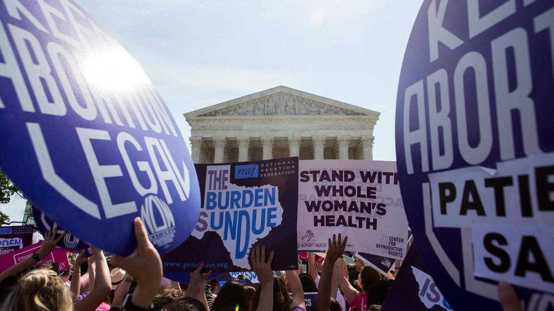 Pro-abortion rights activists rally in front of the U.S. Supreme Court in Washington, June 27, 2016. The court on Monday struck down parts of a restrictive Texas law that could have reduced the number of abortion clinics in the state to about 10 from what was once a high of roughly 40. (Zach Gibson/The New York Times)