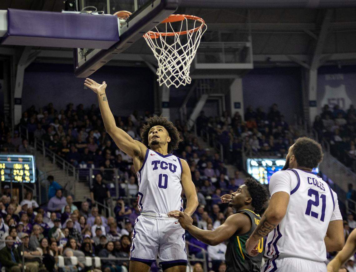 TCU point guard Micah Peavy scores on a layup during their game against Baylor on Saturday at Schollmaier Arena.