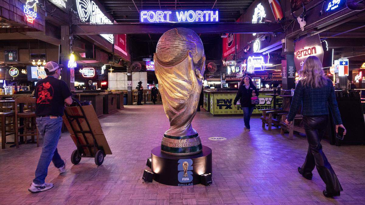 A model of the World Cup trophy is placed in the middle of the venue for the 2025 World Cup draw watch party at Billy Bob’s Texas in the Fort Worth Stockyards on Friday, Dec. 5, 2025.