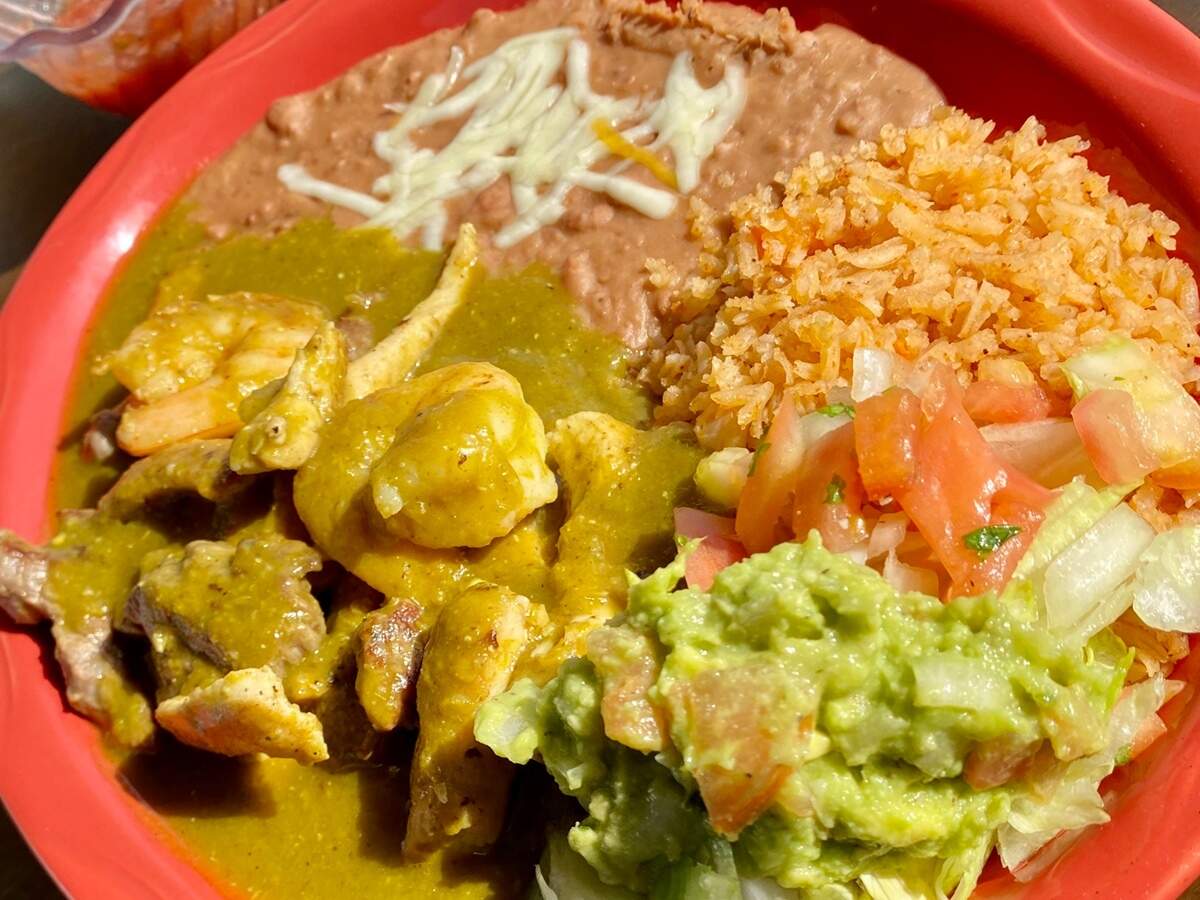 Fajitas in “macho” extra spicy sauce at Josefina’s in River Oaks.