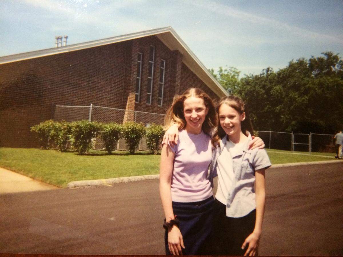 Amanda Hodson, left, and Marybeth Arnold, outside Heritage Baptist Church when they were younger.