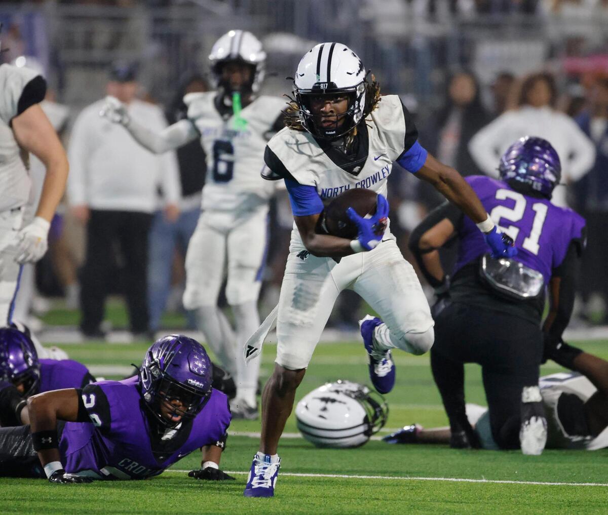 North Crowley running back Cornelius Warren (1) gains yards up the middle of the field during a UIL District 3-6A football game at Crowley ISD Multi-Purpose Stadium in Fort Worth, Texas, Thursday, Nov. 07, 2024.