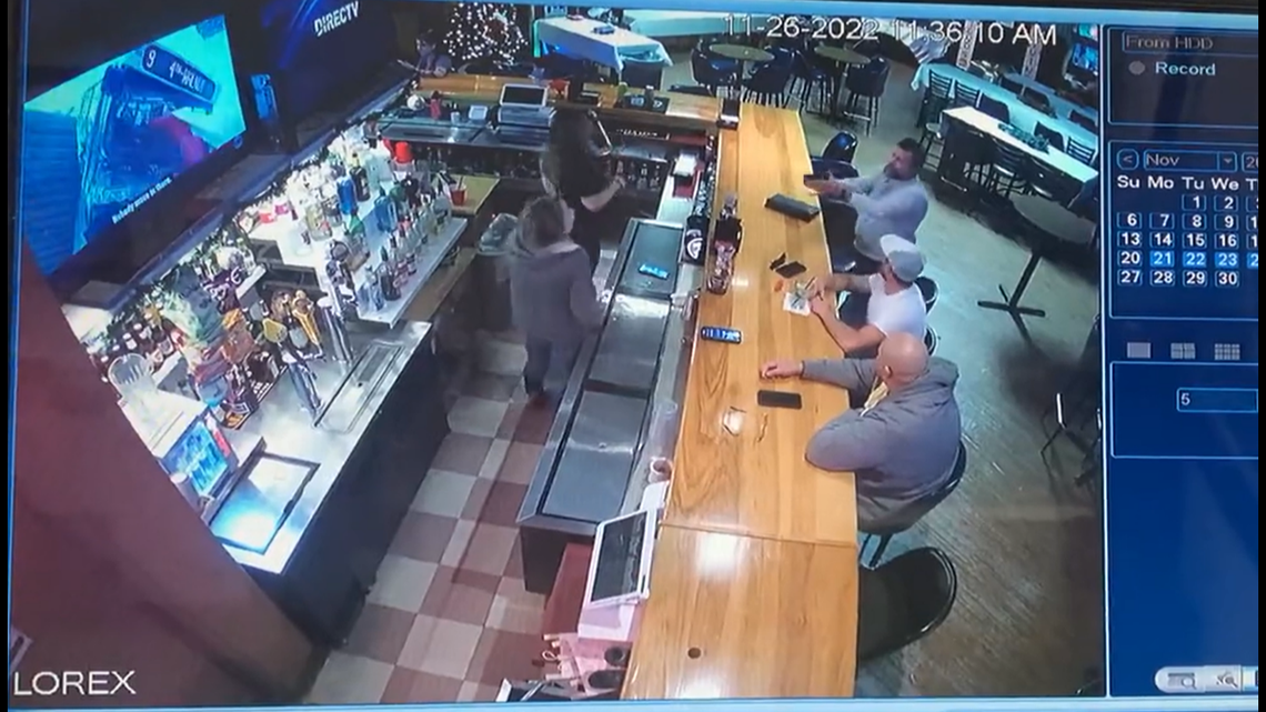 Two bar patrons tackled an Austin, Texas, attorney who was trying to shoot his ex-girlfriend, video shows.
