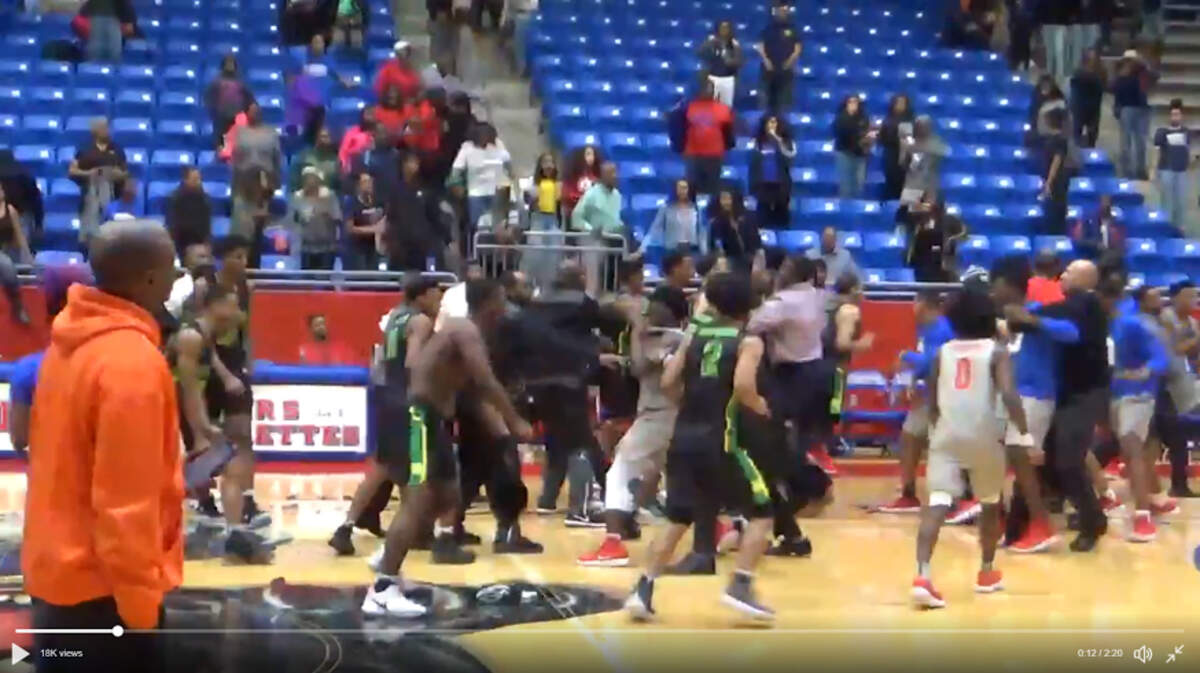 Duncanville and DeSoto boys basketball players fight after a game on Tuesday Feb. 6 at Sandra Meadows Arena in Duncanville.