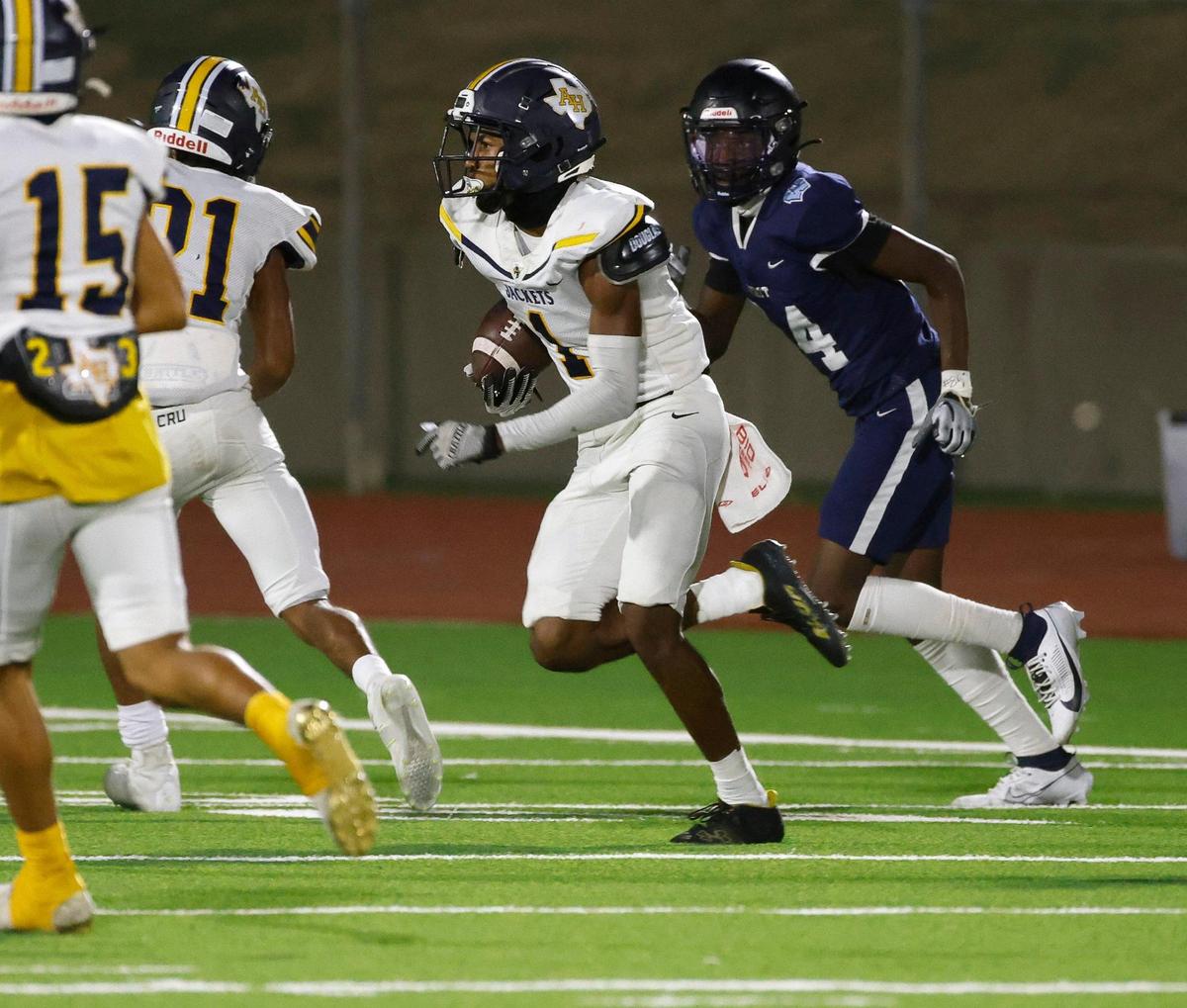 Heights Keith Guidry cuts back across the field to score on a punt return in the second half of a UIL football game at Clark Stadium in Fort Worth, Texas, Friday, Sept. 29, 2023.