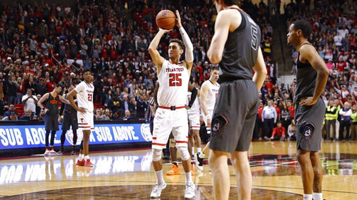 Texas Tech’s Davide Moretti (25) shoots a free throw during overtime of the team’s NCAA college basketball game against Oklahoma State, Wednesday, Feb. 27, 2019, in Lubbock, Texas. (AP Photo/Brad Tollefson)