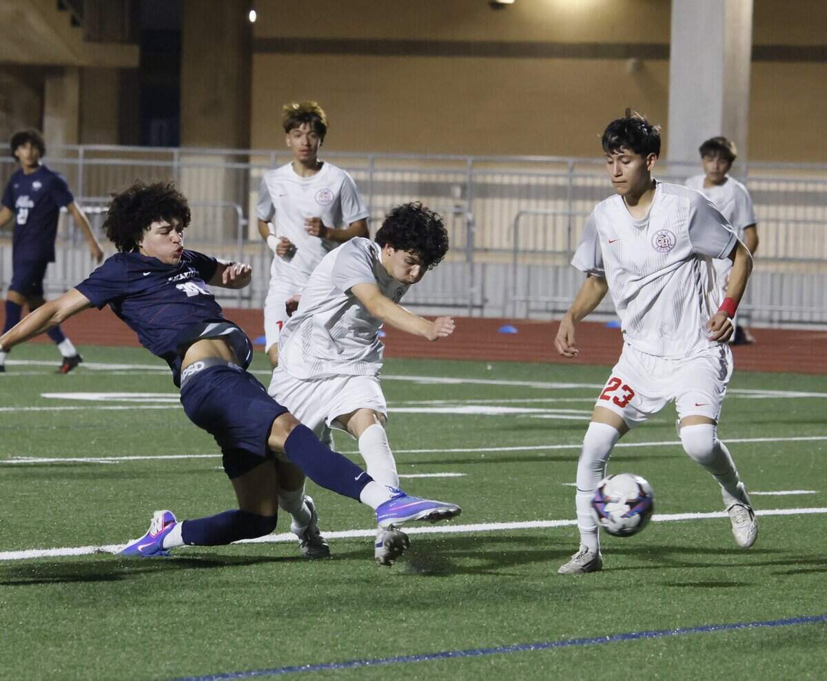 Allen midfielder Dylan Crawford (28) makes a kick on goal during the first half of a UIL area round boys soccer playoff game at Tommy Standridge Stadium in Carrollton, Texas, Tuesday, March 24, 2026.
