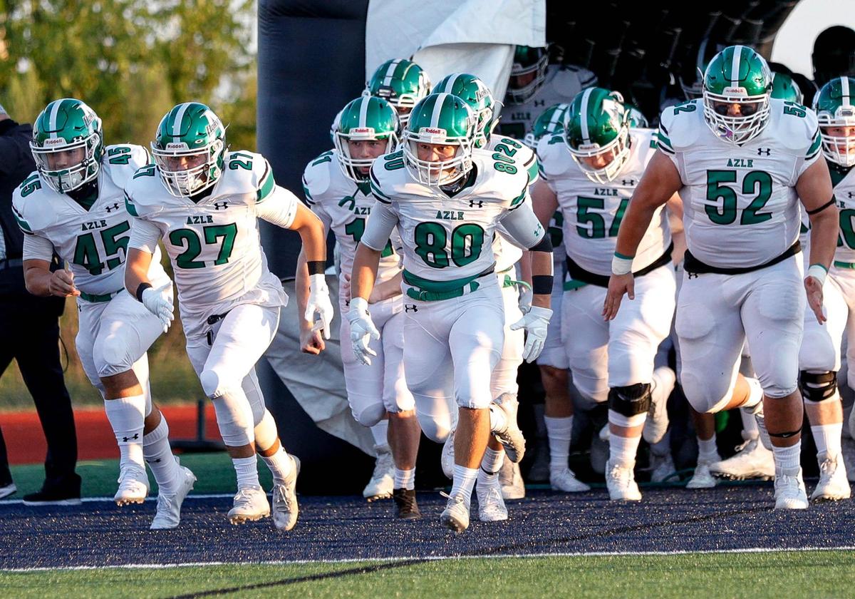 The Azle Hornets come onto the field to face All Saints, Friday night, September 25, 2020 played at All Saints High School in Fort Worth, TX. (Steve Nurenberg Special to the Star-Telegram)
