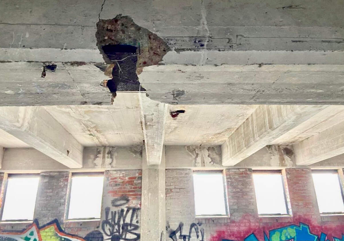 A three-square-foot break in concrete observed from floor eight is a common condition in beams supporting the roof, FWNA’s report said.