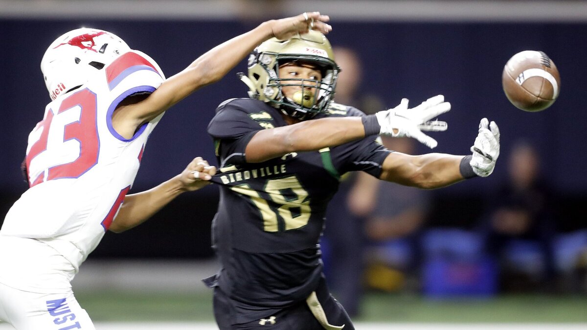 Grapevine defensive back Devante Williams (23) is called for defensive pass interference on a pass intended for Birdville wide receiver Carter Self (18) in the second half of a high school 5A Division I Regional Round football playoff game at Ford Center in Frisco, Texas, Saturday, Dec. 01, 2018. Birdville won 28-21 in overtime. (Star-Telegram Bob Booth)