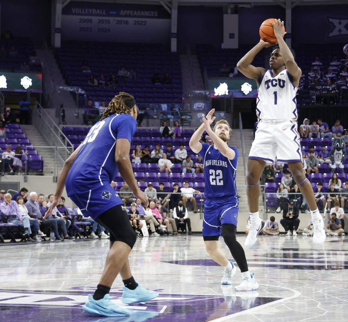 TCU guard Jayden Pierre (1) puts up a successful jumper during the second half of a NCAA basketball game between New Orleans University and TCU at Schollmaier Arena in Fort Worth, Texas, Monday Nov. 03, 2025. The Horned Frogs dropped their home opener 78-74 to the Privateers.